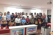 The students take photo with the representative of Acecook Joint Stock Company