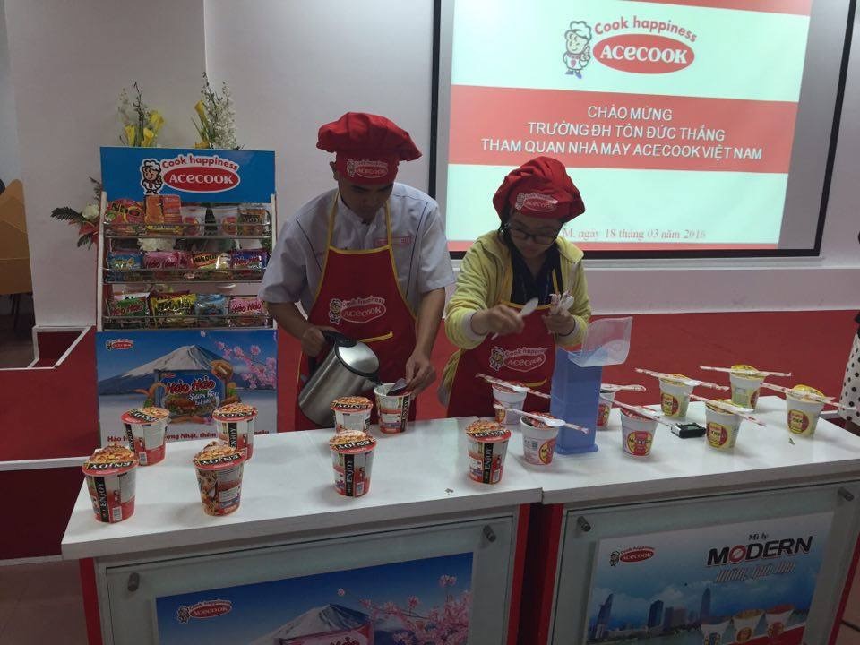 Students with the staff of R & D department prepared instant noodle
